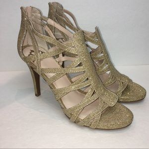 - Fergalicious Shimmery Gold Sandals Size 7NWOT Zip back heels